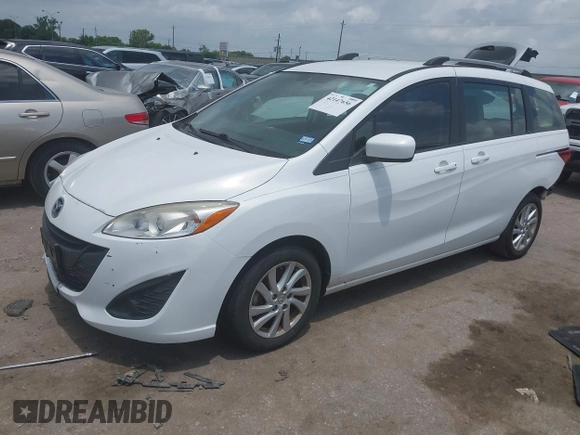 2012 Mazda 5 Sport with VIN JM1CW2BLXC0114770, listed as a IAAI auction lot 42147656 with 99,908 mi miles and . Bid and sale history available at DreamBid. Image 17.