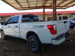 2019 Nissan Titan Pro-4X with VIN 1N6BA1F45KN533051, listed as a IAAI auction lot 42587343 with 134,768 mi miles and . Bid and sale history available at DreamBid. Image 3.