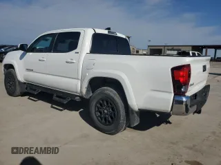 2022 Toyota Tacoma SR with VIN 3TMCZ5AN3NM506811, listed as a Copart auction lot 84630754 with 32,099 mi miles and Salvage title. Bid and sale history available at DreamBid. Image 2.