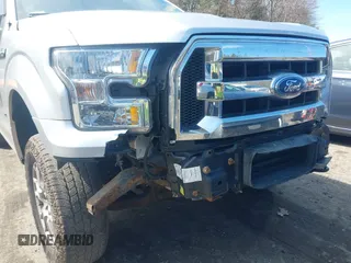 2015 Ford F-150 XLT with VIN 1FTEW1EG5FFA40936, listed as a IAAI auction lot 42011697 with 199,722 mi miles. Bid and sale history available at carsss.com. Image 6.