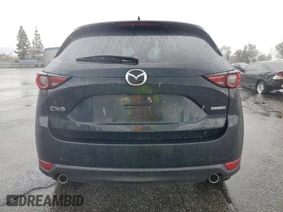 2020 Mazda CX-5 Grand Touring with VIN JM3KFADM3L0815055, listed as a Copart auction lot 48175245 with 56,602 mi miles and Salvage Title. Bid and sale history available at carsss.com. Image 6.