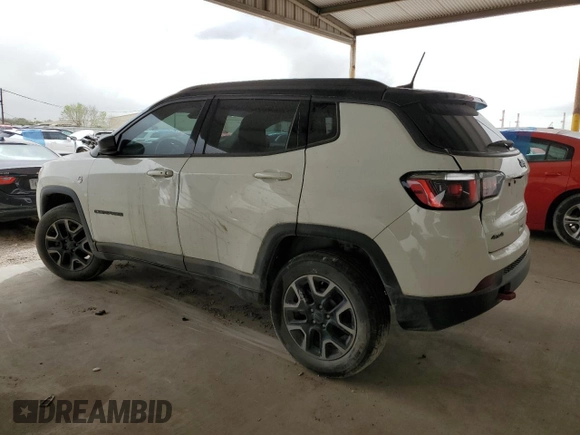 2019 Jeep Compass Trailhawk with VIN 3C4NJDDB9KT670934, listed as a Copart auction lot 48968305 with 101,129 mi miles and Clean Title. Bid and sale history available at carsss.com. Image 2.