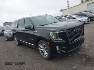2021 GMC Yukon XL Denali with VIN 1GKS2JKL1MR257867, listed as a IAAI auction lot 41510299 with 62,443 mi miles. Bid and sale history available at carsss.com. Image 1.