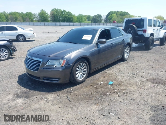 2014 Chrysler 300 with VIN 2C3CCAAG3EH237157, listed as a IAAI auction lot 41986053 with 61,372 mi miles and . Bid and sale history available at DreamBid. Image 2.