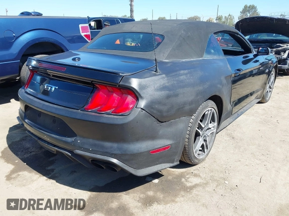 2019 Ford Mustang GT Premium z VIN 1FATP8FF5K5193437, wystawiony jako IAAI lot #42608815 z przebiegiem 67 115 mil mil oraz . Historia ofert i sprzedaży dostępna na DreamBid. Obrazek 4.