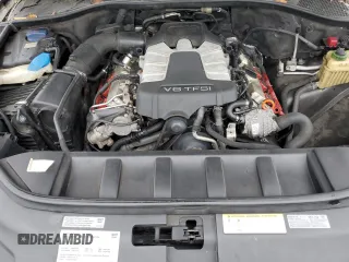 2012 Audi Q7 Premium Plus с VIN WA1LGAFE4CD001239, выставлен на аукционе Copart как лот 55875865 с пробегом 174 043 миль миль и На запчасти • Non repairable. История ставок и продаж доступна на DreamBid. Изображение 12.