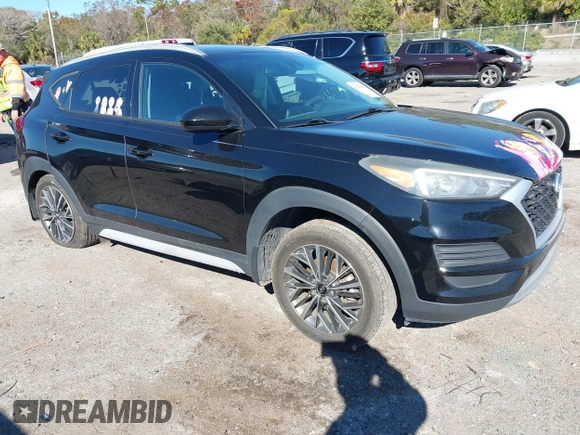 2019 Hyundai Tucson Sport with VIN KM8J33AL5KU902933, listed as a IAAI auction lot 41286316 with 73,799 mi miles. Bid and sale history available at carsss.com. Image 1.