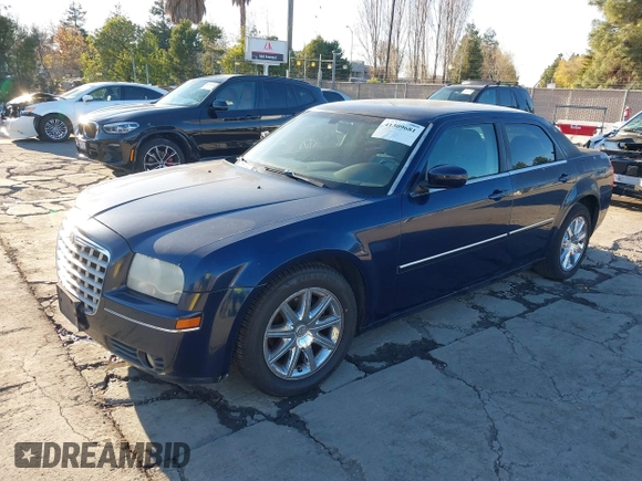 2006 Chrysler 300 Touring with VIN 2C3KA53G46H434572, listed as a IAAI auction lot 41309681 with 245,001 mi miles. Bid and sale history available at carsss.com. Image 2.