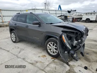 2014 Jeep Cherokee Latitude with VIN 1C4PJMCS9EW302004, listed as a Copart auction lot 51175025 with 106,238 mi miles and Salvage Title. Bid and sale history available at carsss.com. Image 4.