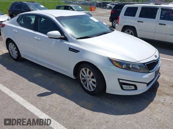 2015 Kia Optima LX with VIN 5XXGM4A76FG443962, listed as a IAAI auction lot 42069701 with 101,516 mi miles. Bid and sale history available at carsss.com. Image 1.