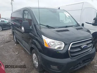 2020 Ford Transit Cargo z VIN 1FTYE1Y80LKB76611, wystawiony jako IAAI lot #42445263 z przebiegiem 104 540 mil mil oraz . Historia ofert i sprzedaży dostępna na DreamBid. Obrazek 1.