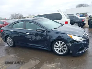 2014 Hyundai Sonata Limited with VIN 5NPEC4ABXEH934116, listed as a IAAI auction lot 41546415 with 105,136 mi miles and . Bid and sale history available at DreamBid. Image 13.