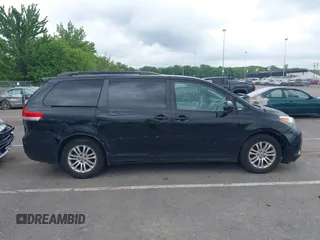 2012 Toyota Sienna XLE AAS with VIN 5TDYK3DC3CS255214, listed as a IAAI auction lot 42390803 with 113,425 mi miles and . Bid and sale history available at DreamBid. Image 13.