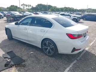 2021 BMW 3 Series 330i with VIN 3MW5R1J00M8B52627, listed as a IAAI auction lot 40722823 with 36,769 mi miles. Bid and sale history available at carsss.com. Image 3.
