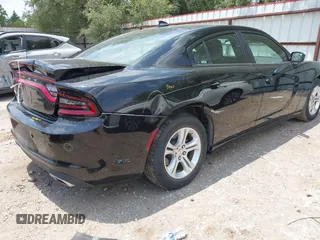 2023 Dodge Charger SXT z VIN 2C3CDXBG0PH564343, wystawiony jako IAAI lot #42351311 z przebiegiem 52 570 mil mil oraz . Historia ofert i sprzedaży dostępna na DreamBid. Obrazek 4.