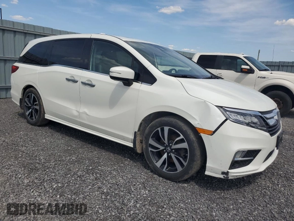 2019 Honda Odyssey Touring z VIN 5FNRL6H80KB501681, wystawiony jako Copart lot #58814945 z przebiegiem 105 287 mil mil oraz Szkoda całkowita • Salvage title. Historia ofert i sprzedaży dostępna na DreamBid. Obrazek 4.