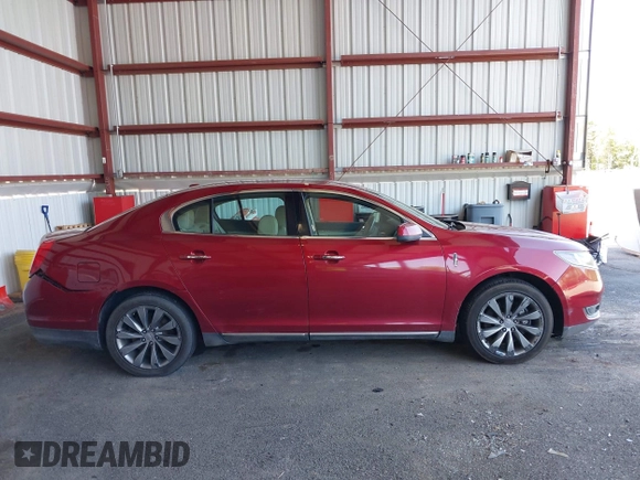 2014 Lincoln MKS z VIN 1LNHL9DK0EG606497, wystawiony jako IAAI lot #42279603 z przebiegiem 129 972 mil mil oraz . Historia ofert i sprzedaży dostępna na DreamBid. Obrazek 13.