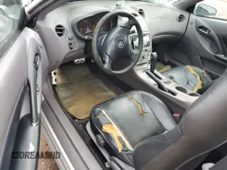 2000 Toyota Celica GTS z VIN JTDDY32T8Y0012279, wystawiony jako Copart lot #51768935 z przebiegiem 129 520 mil mil oraz Szkoda całkowita • Salvage title. Historia ofert i sprzedaży dostępna na DreamBid. Obrazek 8.