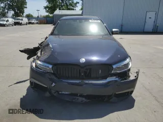 2019 BMW 5 Series M550i xDrive with VIN WBAJB9C5XKB287877, listed as a Copart auction lot 52994065 with 52,460 mi miles and Salvage title. Bid and sale history available at DreamBid. Image 5.