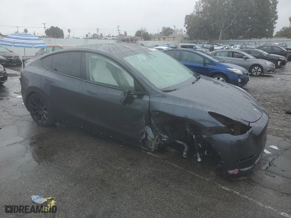 2024 Tesla Model Y with VIN 7SAYGDED5RF054851, listed as a Copart auction lot 42835055 with 14,695 mi miles and Salvage Title. Bid and sale history available at carsss.com. Image 4.