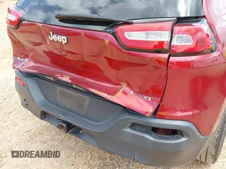 2015 Jeep Cherokee Limited with VIN 1C4PJMDS1FW571937, listed as a IAAI auction lot 42106209 with 162,666 mi miles and . Bid and sale history available at DreamBid. Image 6.