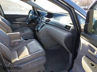 2013 Honda Odyssey Touring with VIN 5FNRL5H9XDB009973, listed as a IAAI auction lot 41904710 with 219,067 mi miles. Bid and sale history available at carsss.com. Image 5.