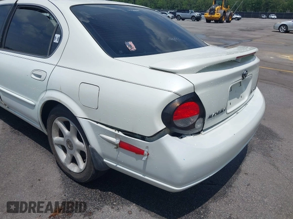 2000 Nissan Maxima GXE z VIN JN1CA31D6YT542083, wystawiony jako IAAI lot #42306685 z przebiegiem 296 613 mil mil oraz . Historia ofert i sprzedaży dostępna na DreamBid. Obrazek 6.