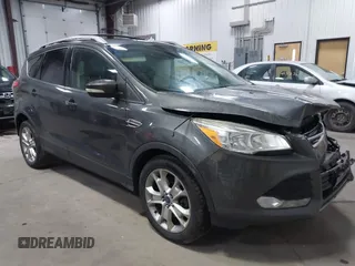 2016 Ford Escape Titanium with VIN 1FMCU9J90GUB35593, listed as a IAAI auction lot 42309020 with 173,019 mi miles and . Bid and sale history available at DreamBid. Image 1.