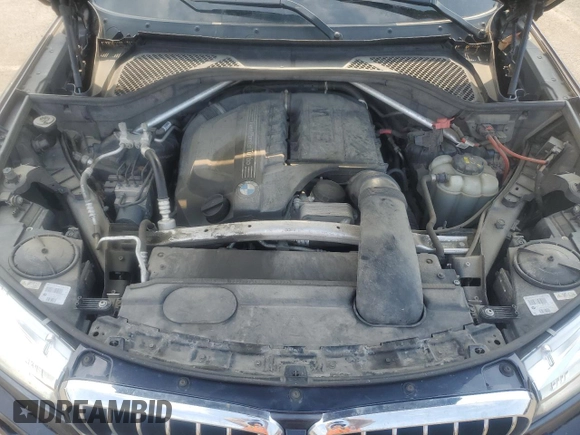 2017 BMW X5 xDrive35i z VIN 5UXKR0C57H0U52284, wystawiony jako Copart lot #60208755 z przebiegiem 156 706 mil mil oraz Szkoda całkowita • Salvage title. Historia ofert i sprzedaży dostępna na DreamBid. Obrazek 12.