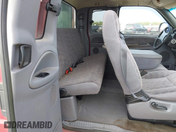 1998 Dodge 1500 with VIN 1B7HF13Y5WJ180264, listed as a IAAI auction lot 41858346 with 117,340 mi miles and . Bid and sale history available at DreamBid. Image 8.