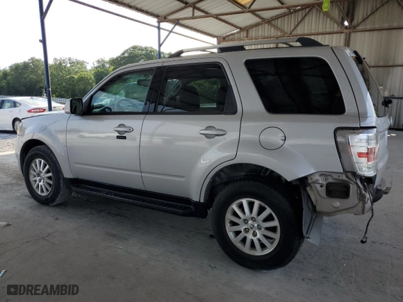 2010 Mercury Mariner Premier with VIN 4M2CN8HG2AKJ00812, listed as a Copart auction lot 61412784 with 215,509 mi miles and Salvage Title. Bid and sale history available at carsss.com. Image 2.