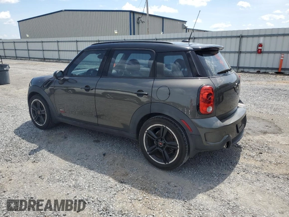 2012 MINI Countryman S with VIN WMWZC5C5XCWL56232, listed as a Copart auction lot 60298705 with 140,425 mi miles and Salvage title. Bid and sale history available at DreamBid. Image 2.
