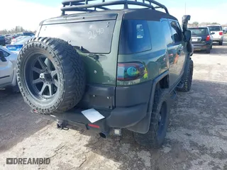 2014 Toyota FJ Cruiser with VIN JTEBU4BFXEK192640, listed as a IAAI auction lot 41349553 with 49,308 mi miles. Bid and sale history available at carsss.com. Image 4.