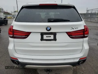 2014 BMW X5 xDrive35d with VIN 5UXKS4C51E0C07135, listed as a Copart auction lot 51867345 with 105,895 mi miles and Clean Title. Bid and sale history available at carsss.com. Image 6.