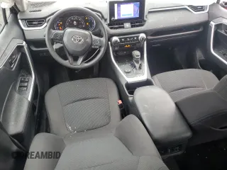 2023 Toyota RAV4 Hybrid LE with VIN 4T3LWRFV8PU098106, listed as a Copart auction lot 57988765 with 17,580 mi miles and Salvage title. Bid and sale history available at DreamBid. Image 8.