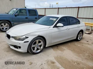 2014 BMW 3 Series 320i with VIN WBA3B1C57EP679989, listed as a Copart auction lot 56383665 with 125,617 mi miles and Salvage title. Bid and sale history available at DreamBid. Image 1.