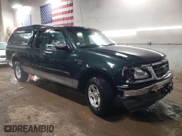 2002 Ford F-150 XL with VIN 1FTRX17L22NB97610, listed as a Copart auction lot 47186355 with 70,767 mi miles and Salvage title. Bid and sale history available at DreamBid. Image 4.