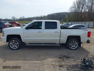 2015 Chevrolet Silverado 1500 High Country with VIN 3GCUKTEC7FG205805, listed as a IAAI auction lot 41815859 with 130,028 mi miles. Bid and sale history available at carsss.com. Image 14.