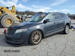 2014 Lincoln MKT EcoBoost with VIN 2LMHJ5AT1EBL57487, listed as a Copart auction lot 50182645 with 138,743 mi miles and Salvage Title. Bid and sale history available at DreamBid. Image 1.