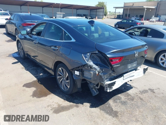 2022 Honda Insight Touring with VIN 19XZE4F90NE001251, listed as a IAAI auction lot 42303914 with 161,489 mi miles and . Bid and sale history available at DreamBid. Image 3.