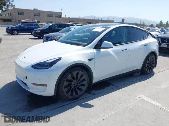 2022 Tesla Model Y Performance z VIN 7SAYGDEF2NF347456, wystawiony jako IAAI lot #42177725 z przebiegiem 29 374 mil mil oraz . Historia ofert i sprzedaży dostępna na DreamBid. Obrazek 20.