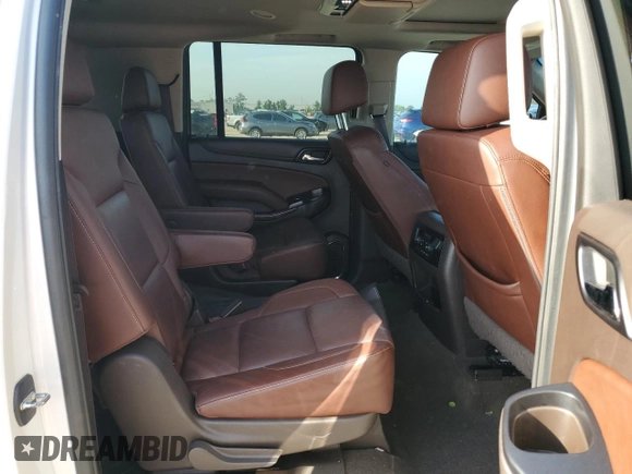2017 Chevrolet Suburban Premier with VIN 1GNSCJKCXHR348044, listed as a Copart auction lot 55957535 with 112,131 mi miles and Salvage title. Bid and sale history available at DreamBid. Image 11.