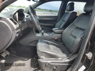 2014 Jeep Grand Cherokee Limited z VIN 1C4RJFBT6EC184557, wystawiony jako Copart lot #57657095 z przebiegiem 157 688 mil mil oraz Szkoda całkowita • Salvage title. Historia ofert i sprzedaży dostępna na DreamBid. Obrazek 7.