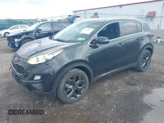 2021 Kia Sportage S z VIN KNDP6CACXM7848732, wystawiony jako IAAI lot #42208627 z przebiegiem 31 835 mil mil oraz . Historia ofert i sprzedaży dostępna na DreamBid. Obrazek 2.