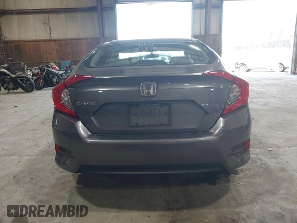 2016 Honda Civic Sedan LX with VIN 19XFC2F58GE214672, listed as a IAAI auction lot 42067792 with 73,929 mi miles. Bid and sale history available at carsss.com. Image 15.