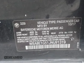 2018 BMW 3 Series 320i with VIN WBA8E1G51JNU91319, listed as a IAAI auction lot 41690084 with 67,609 mi miles. Bid and sale history available at carsss.com. Image 9.