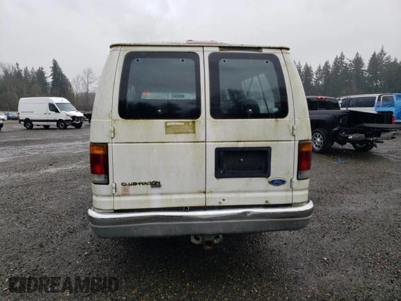 1994 Ford Econoline Wagon XL z VIN 1FBJS31H1RHB32773, wystawiony jako Copart lot #82008864 z przebiegiem Nie podano mil oraz Tytuł czysty. Historia ofert i sprzedaży dostępna na DreamBid. Obrazek 6.