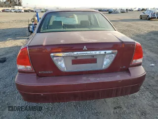 2002 Mitsubishi Diamante LS z VIN 6MMAP67P12T008394, wystawiony jako Copart lot #44022475 z przebiegiem 79 846 mil mil oraz Szkody całkowita. Historia ofert i sprzedaży dostępna na DreamBid. Obrazek 6.