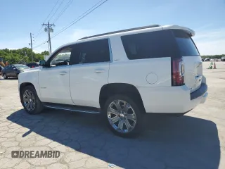 2016 GMC Yukon SLT with VIN 1GKS1BKCXGR439435, listed as a Copart auction lot 61202804 with 168,196 mi miles and Salvage Title. Bid and sale history available at carsss.com. Image 2.