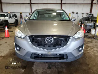 2014 Mazda CX-5 Touring z VIN JM3KE4CY5E0393463, wystawiony jako Copart lot #57776665 z przebiegiem 91 565 mil mil oraz Szkoda całkowita • Salvage title. Historia ofert i sprzedaży dostępna na DreamBid. Obrazek 5.